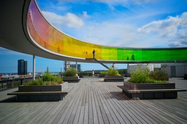 photo of the rainbow walkway at the aarhus art museum in aarhus denmark. photo by julius yls on unsplash.